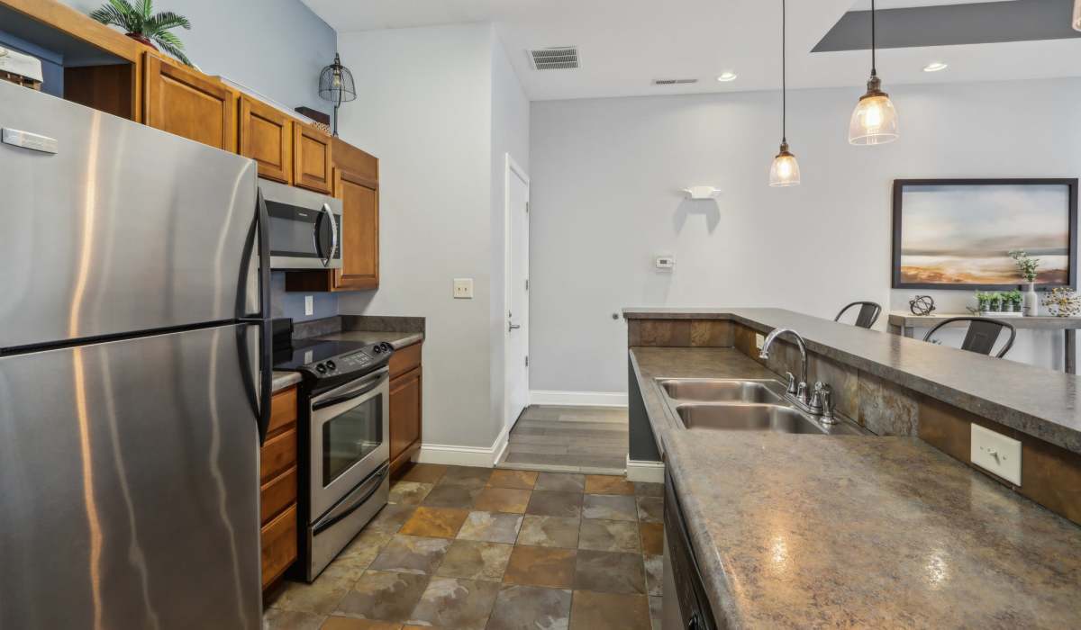 Kitchen with stainless-steel appliances at Bluestone in Greenfield,Indiana