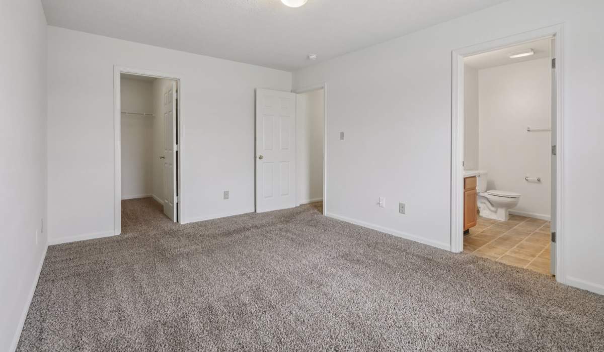 Bedroom with attached bathroom at Broadway Village Apartments in Greenfield,Indiana