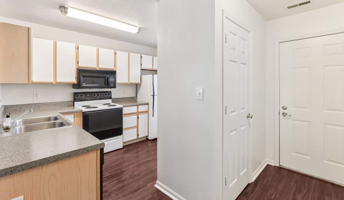 Well-lit kitchen at Broadway Village Apartments in Greenfield,Indiana