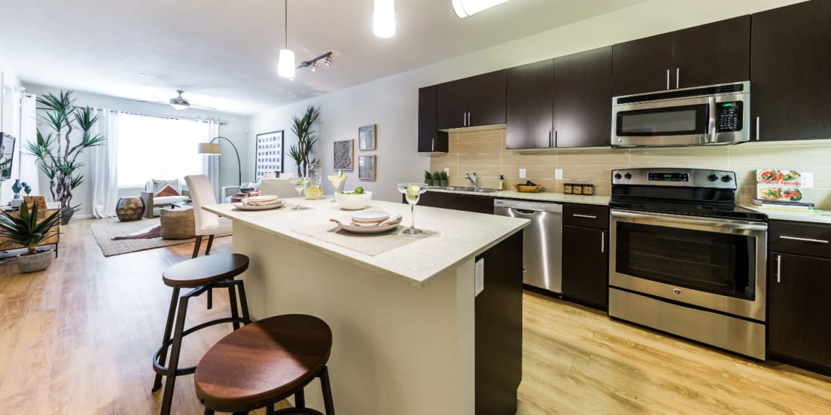 Spacious kitchen and living room at Marquis at Desert Ridge in Phoenix, Arizona