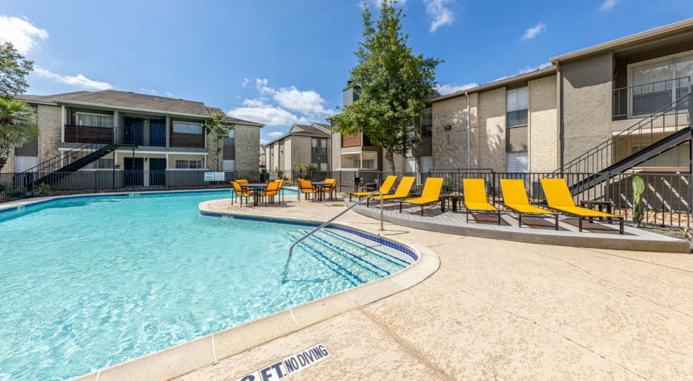 Residents can enjoy a resort-style pool at The Landing at Clear Lake in Webster, Texas