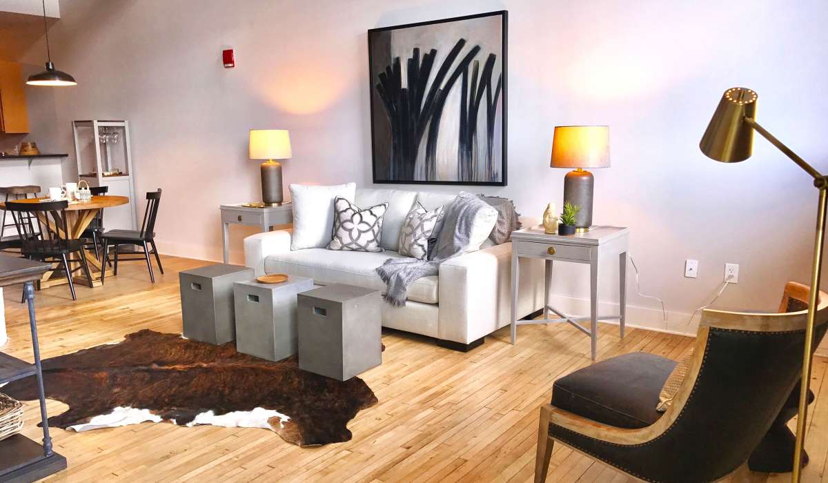 Cozy seating spot in the living area at Stone Center Lofts in Wheeling, West Virginia