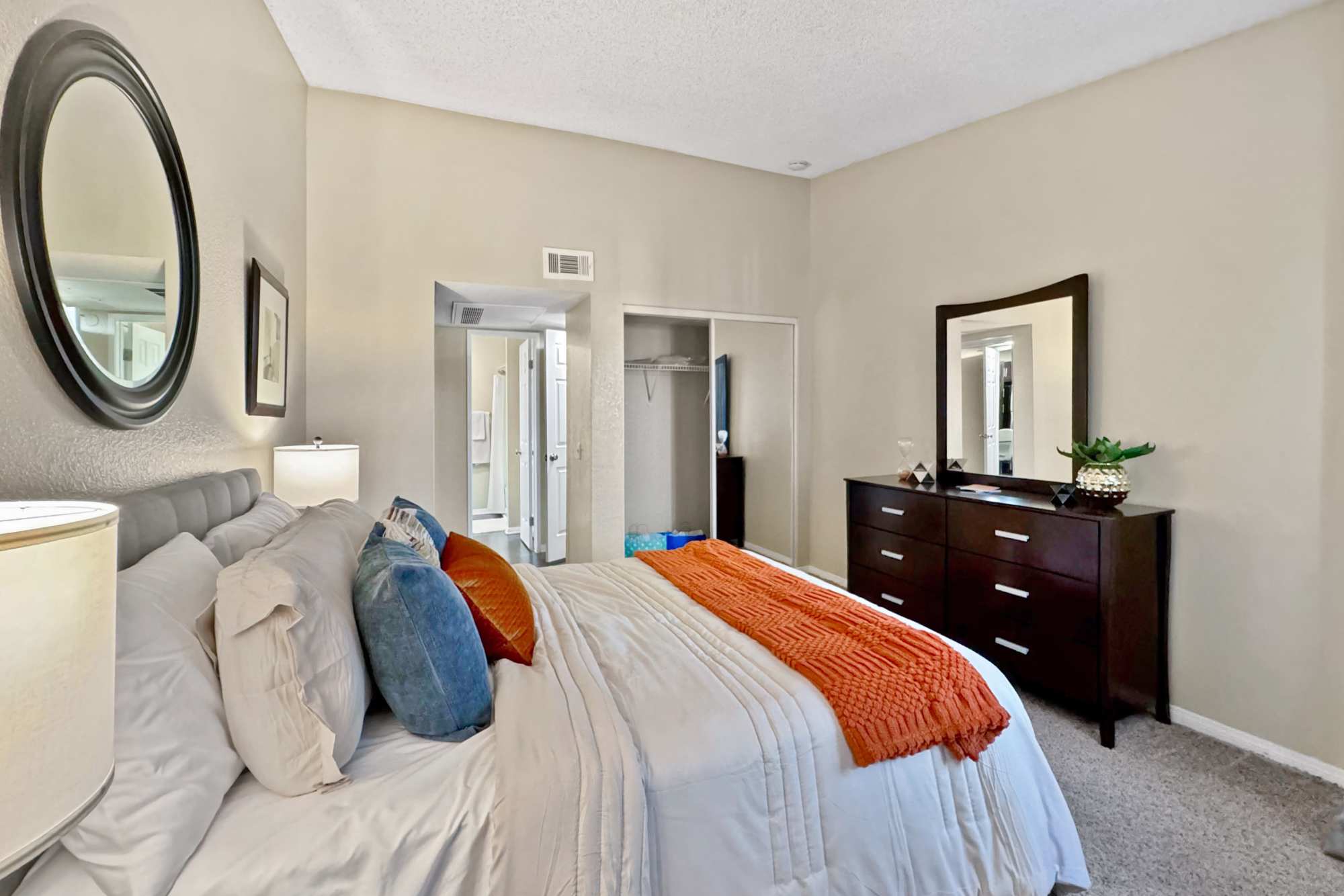 Spacious master bedroom at Tuscany Village Apartments in Ontario, California