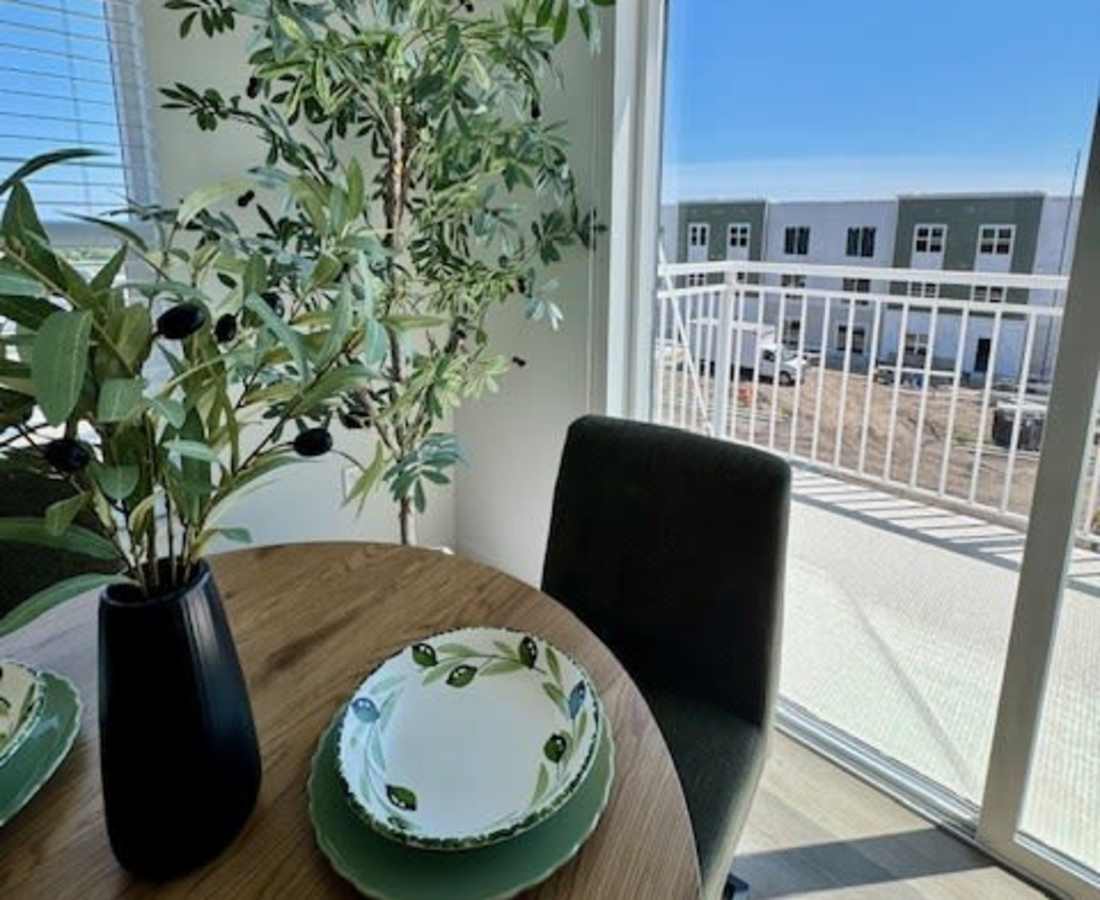 New buildings visible through large window at Pritchard Park Place in Racine, Wisconsin