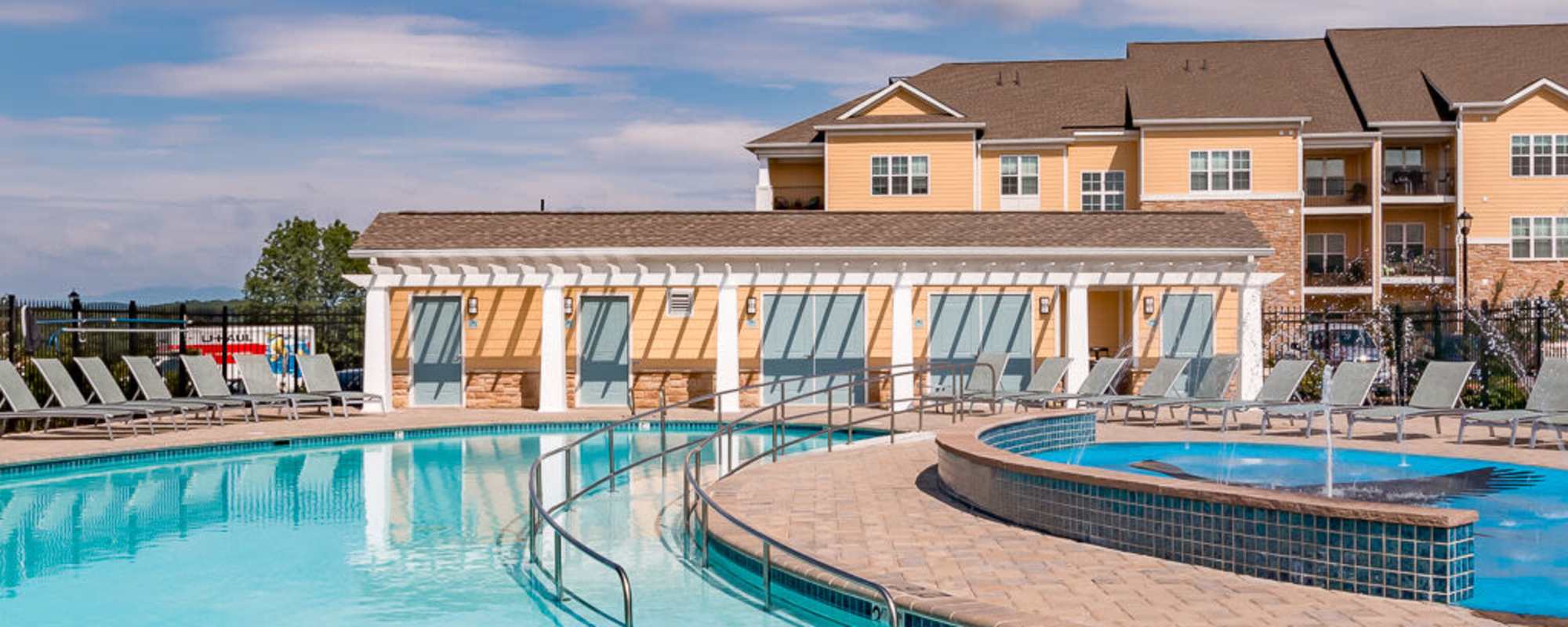 Resort style swimming pool at The Apartments at Goose Creek in Fishersville, Virginia