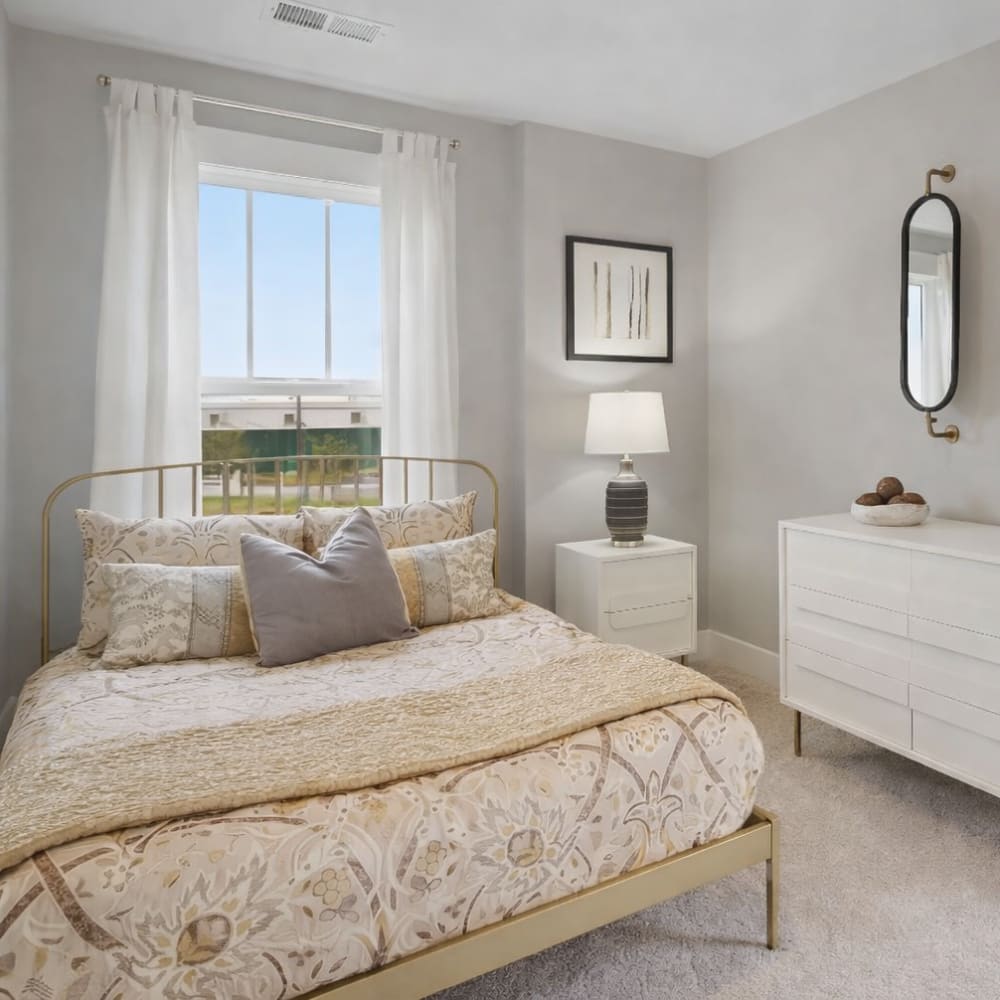 Furnished bedroom at The Wilds at Cedar Mountain in Asheville, North Carolina