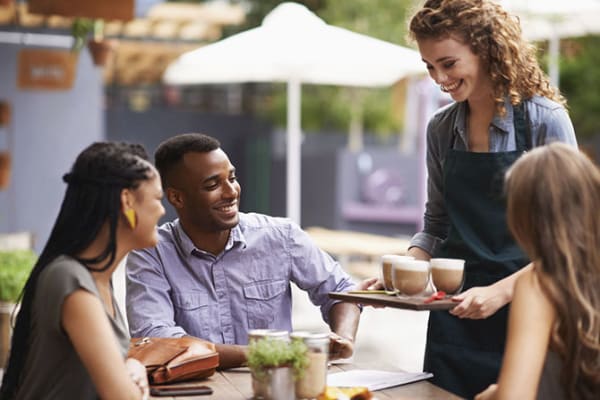 Residents eating together at a restaurant in Aliquippa, Pennsylvania near The Kane