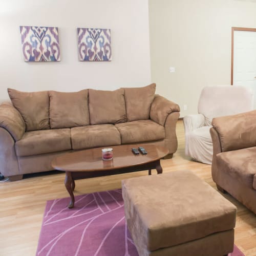 Living room with seating at Golf View in Pleasant Hill, Iowa