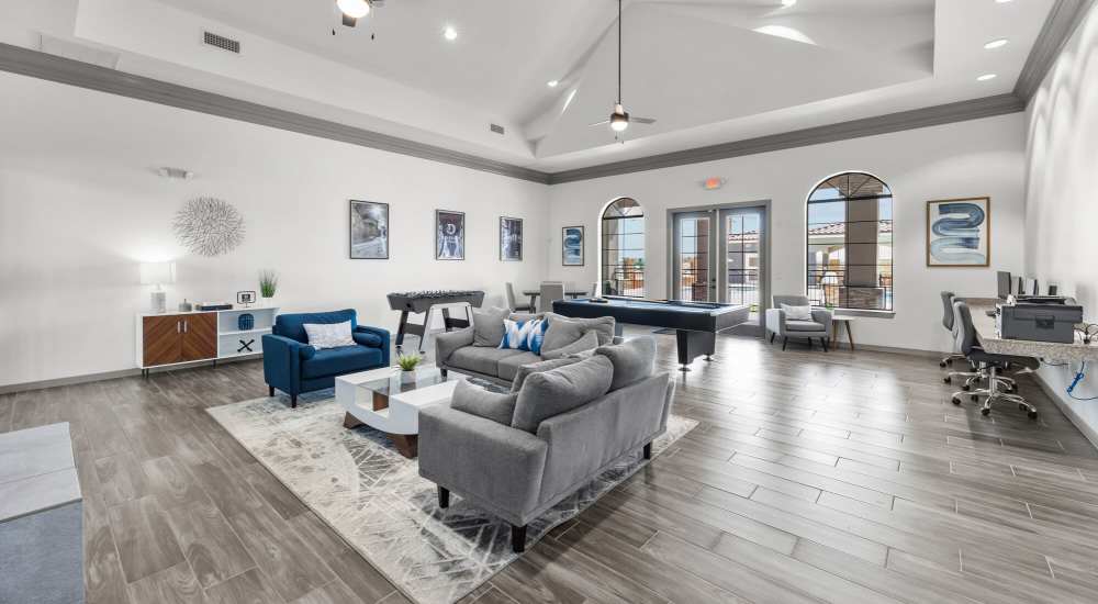 Clubhouse with wooden flooring at District At Pellicano in El Paso, Texas