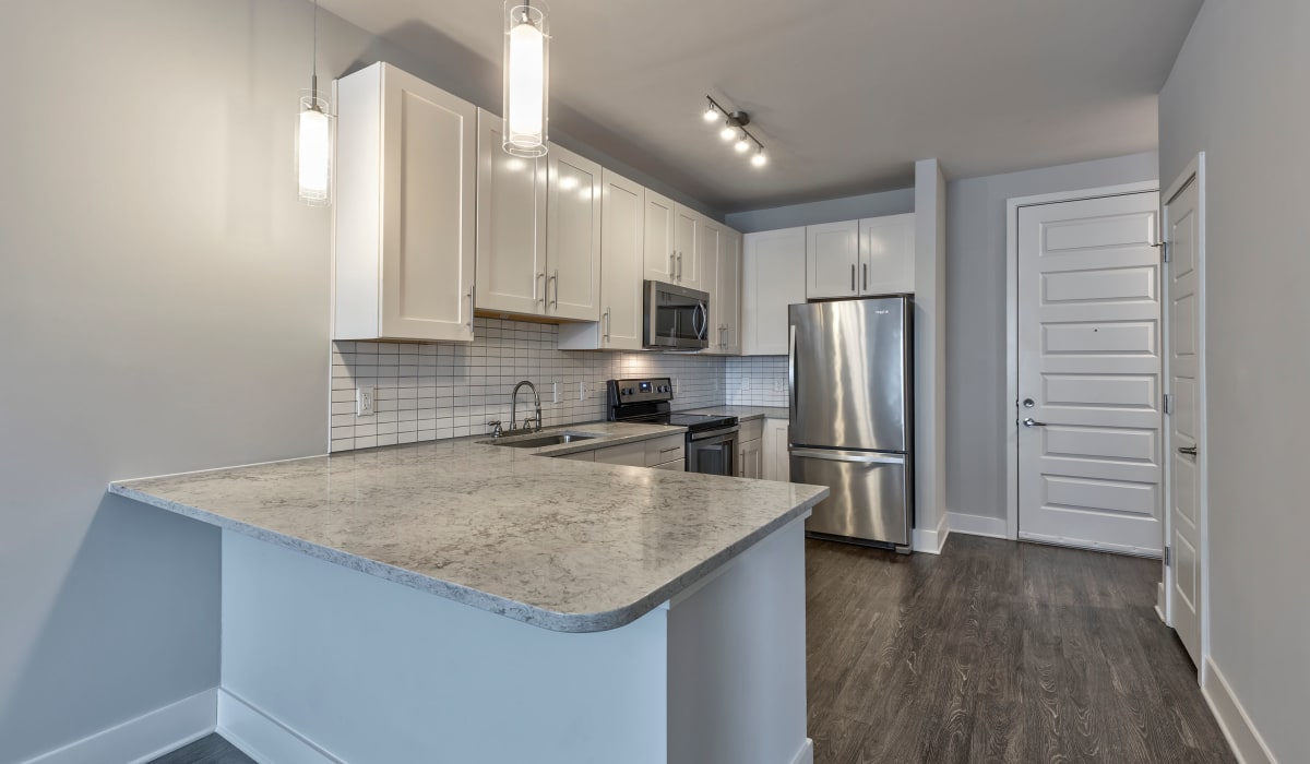 Kitchen with stainless-steel appliances at 1400 Chestnut Apartments, Chattanooga, Tennessee