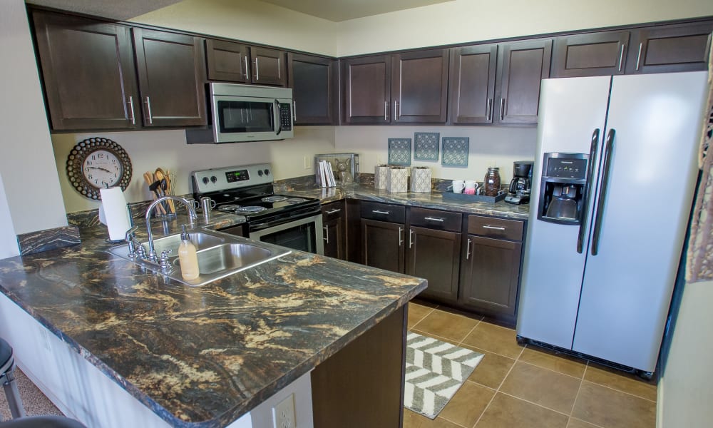 Fully equipped kitchen at Mission Point Apartments in Moore, Oklahoma
