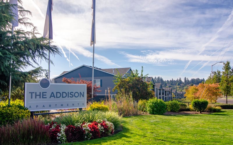 The front monument sign at The Addison Apartments in Vancouver, Washington