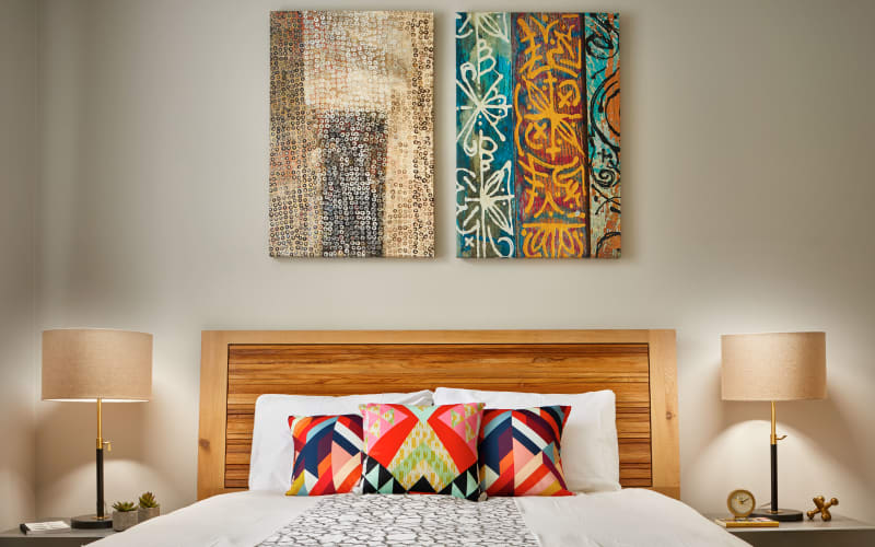 Spacious bedroom with paintings on the wall at Brookside Village in Auburn, Washington