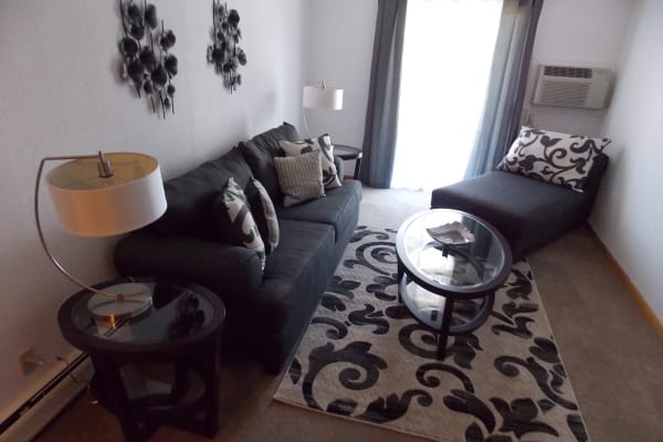 Living room space at Westgate Arms Apartments in Salem, New Hampshire