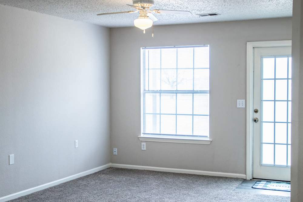 Spacious living area with ceilings at Whispering Plains Apartments in Guymon, Oklahoma