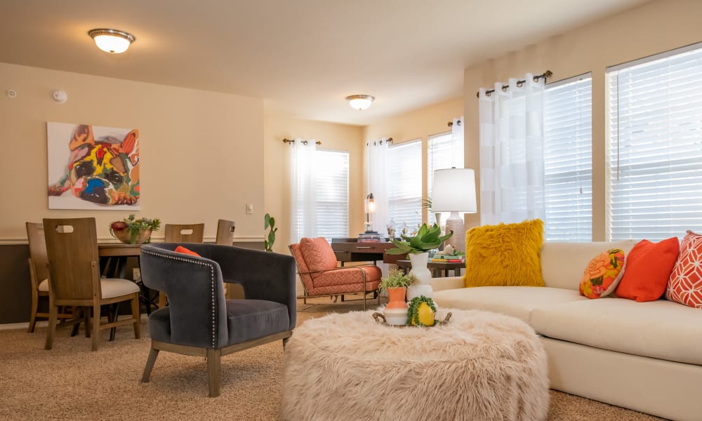Spacious living room with plush carpeting at Mission Point Apartments in Moore, Oklahoma