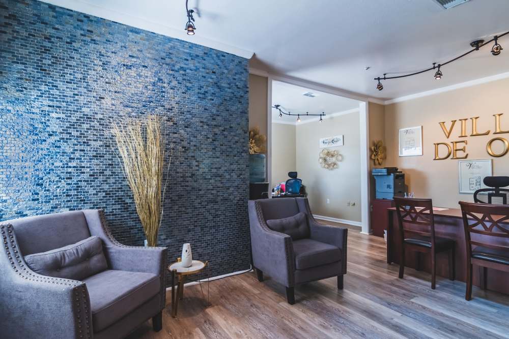 Leasing office with chairs at Villa De Oro in San Antonio, Texas