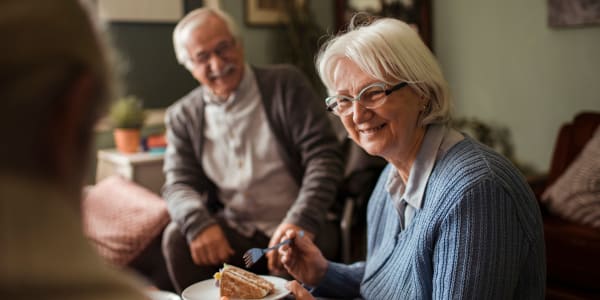 Residents sitting and talking over a meal at Maple Ridge Care Center in Spooner, Wisconsin