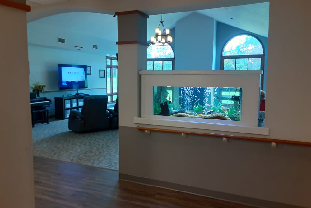 Entry to common sitting room with aquarium at The Atrium in Rockford, Illinois.