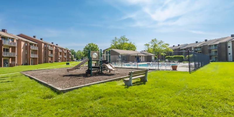 Playground and pool at Rolling Park Apartments in Windsor Mill, Maryland