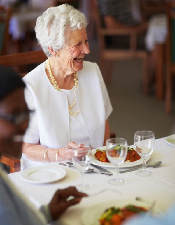 Resident enjoying dinner at The Retreat at Carolina Bay in Hartsville, South Carolina