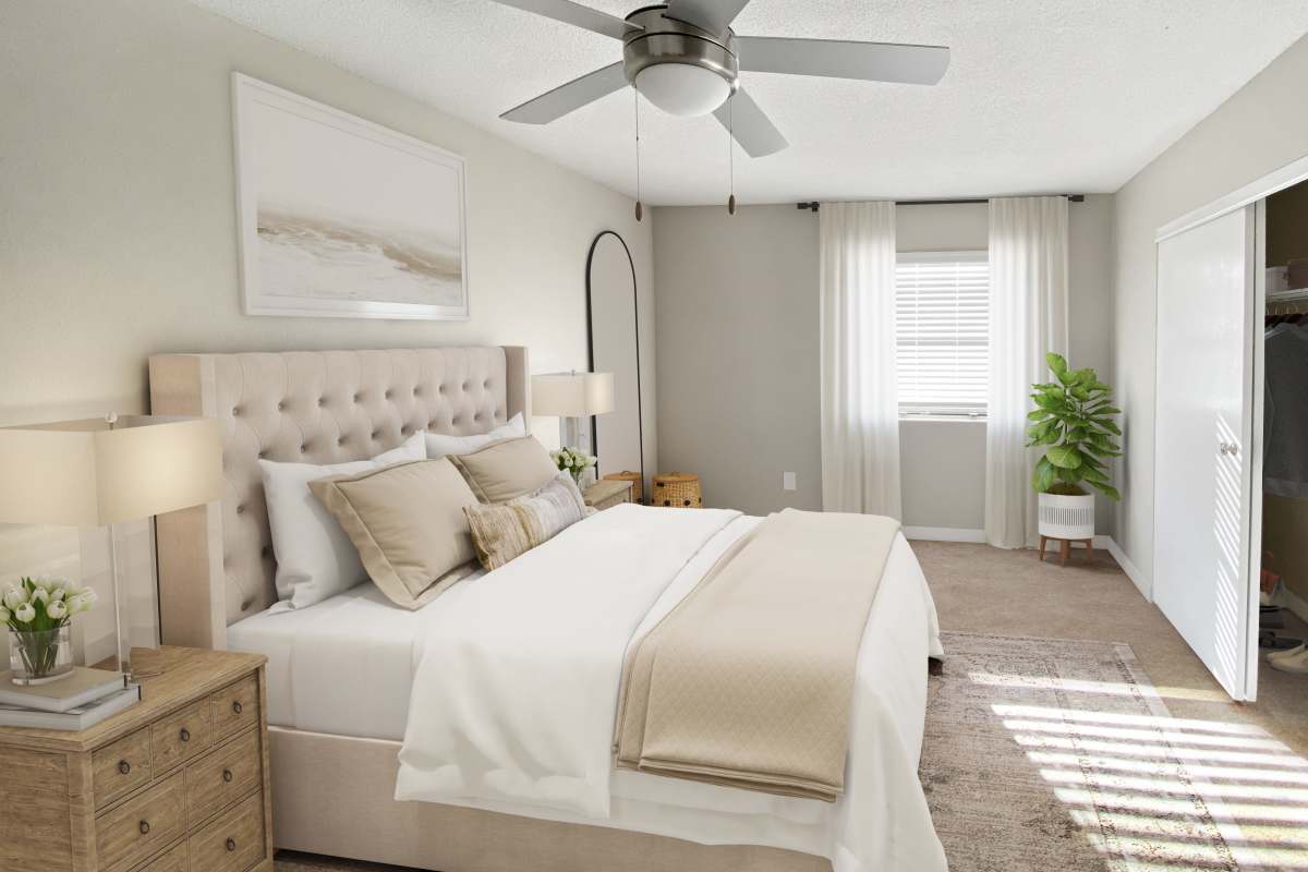 Model bedroom with closet space at Aspen Lodge in Overland Park, Kansas