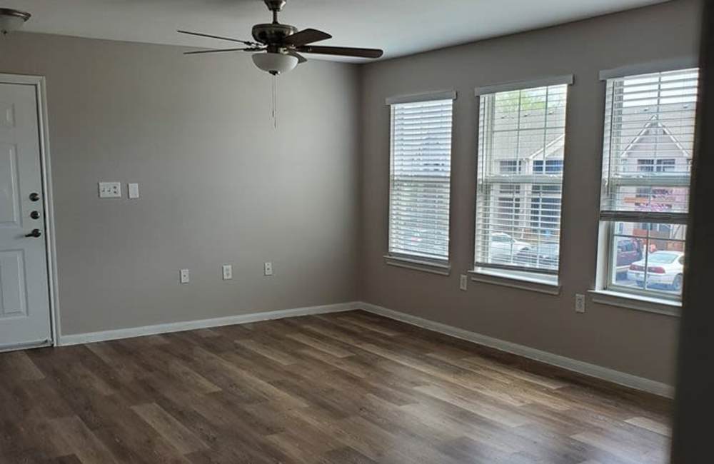 Resident playing with her dog at Autumn Brook Apartments in Chickasha, Oklahoma