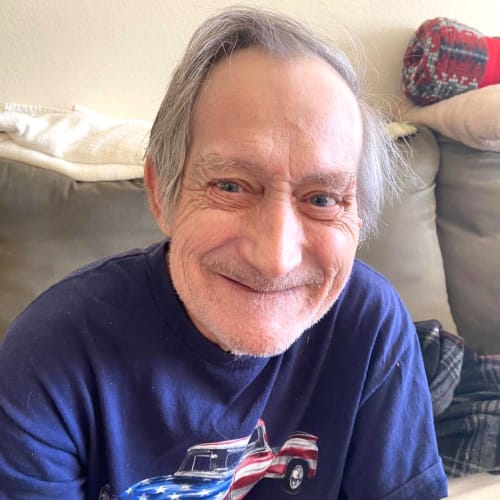 Smiling resident at Canoe Brook Assisted Living in Broken Arrow, Oklahoma