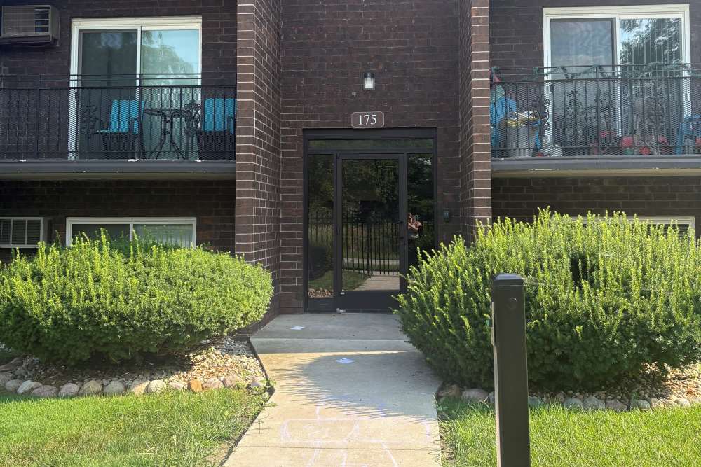 Courtyard and apartment balconies at Edgewood Group Apartments in Merrillville, Indiana
