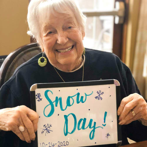 Resident celebrating a snow day The Oxford Grand Assisted Living & Memory Care in Wichita, Kansas