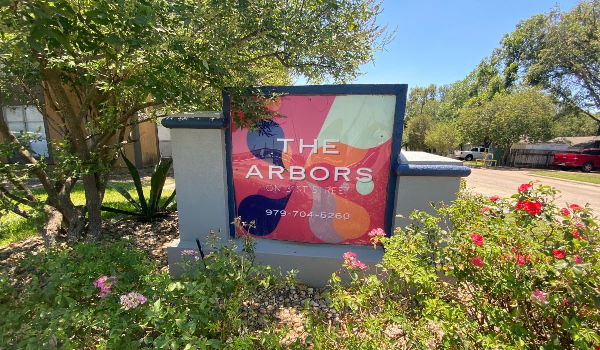 Community sign at Arbors on 31st in Bryan, Texas