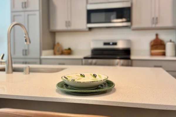 Plates on a kitchen countertop at Pritchard Park Place in Racine, Wisconsin