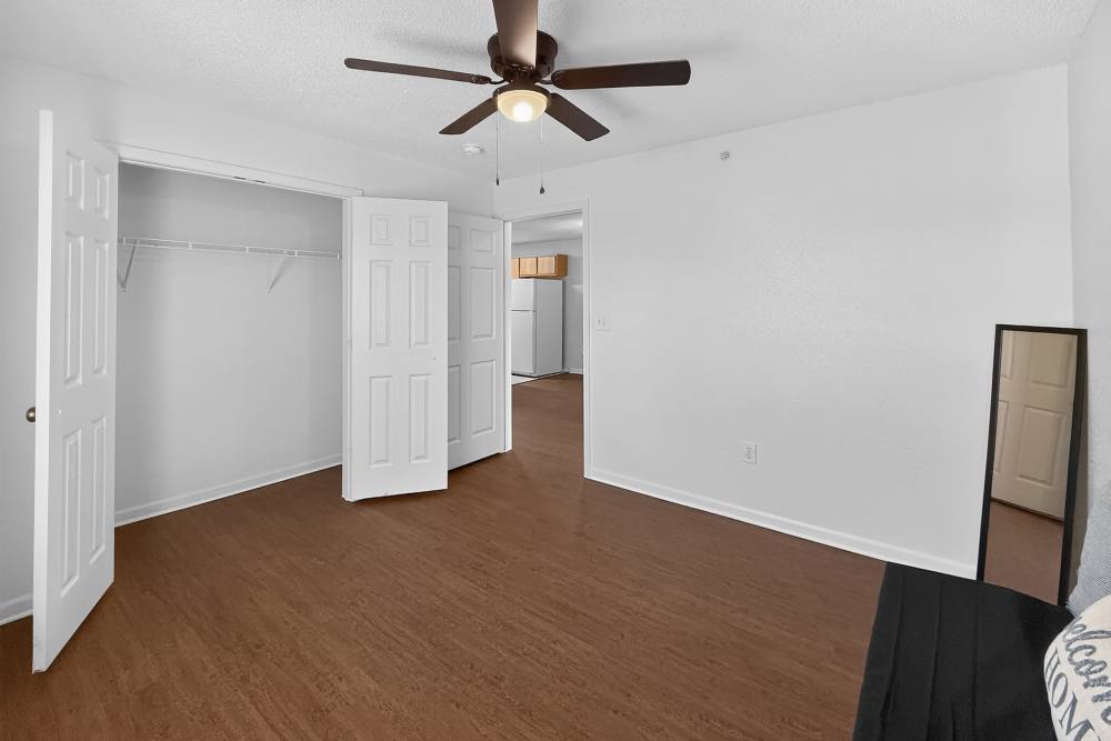 Apartment bedroom with walk-in closet at Lakeside in Mt Pleasant, Texas