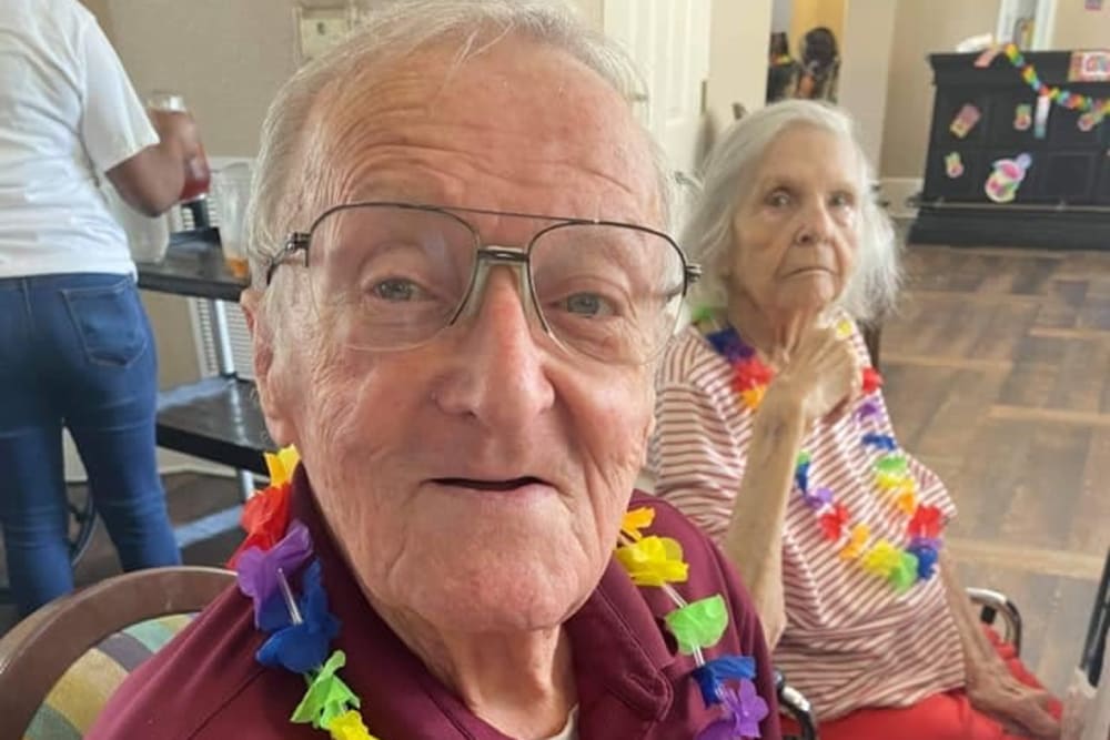 Residents having a luau at Carolina Gardens at Kathwood in Columbia, South Carolina