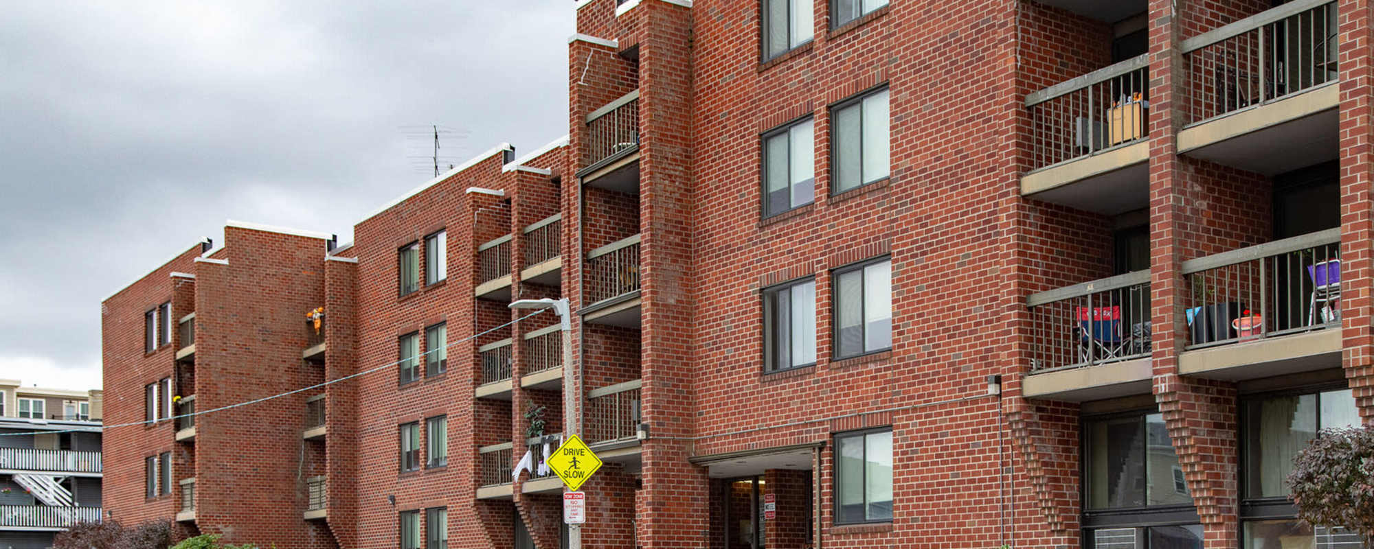 Multi-story brick apartment homes at Victory Gardens in East Boston, Massachusetts