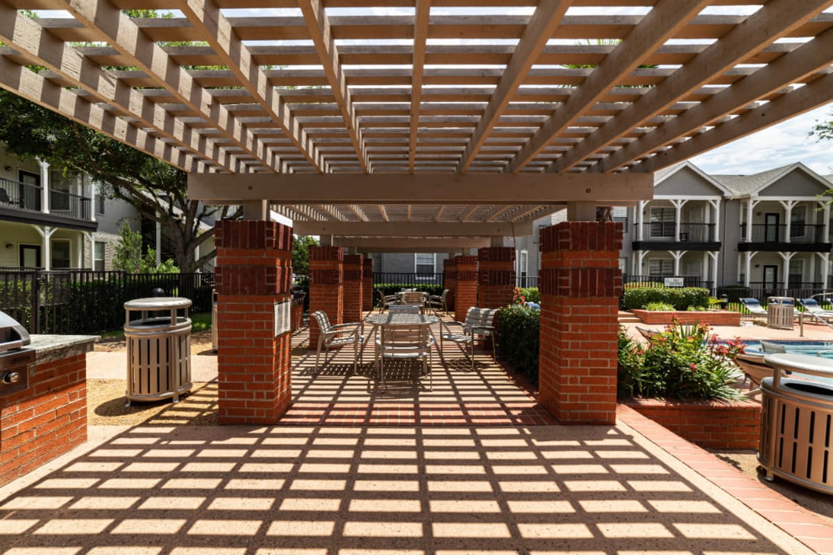 Outdoor covered BBQ and dining area at Marquis at Lantana in Flower Mound, Texas