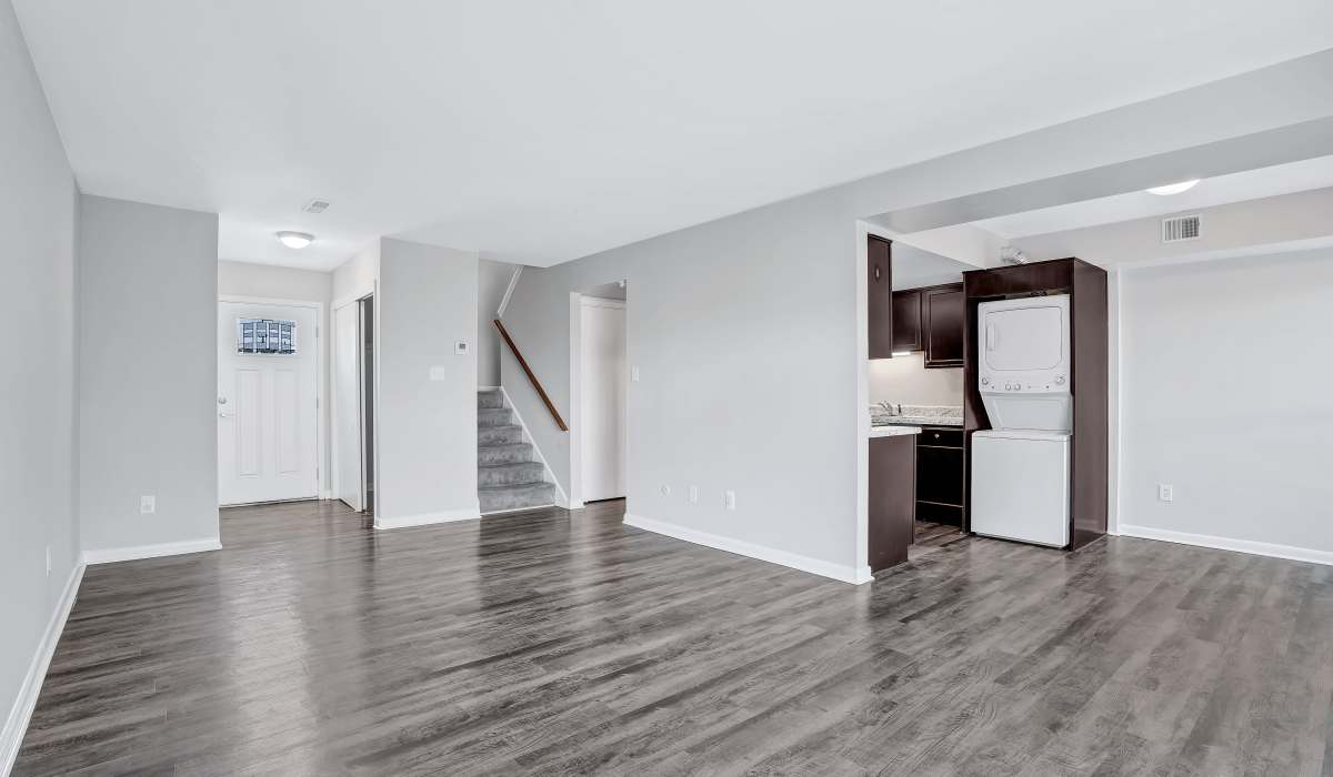 Spacious living room and a view of the kitchen at BayPointe Crossing in Virginia Beach, Virginia