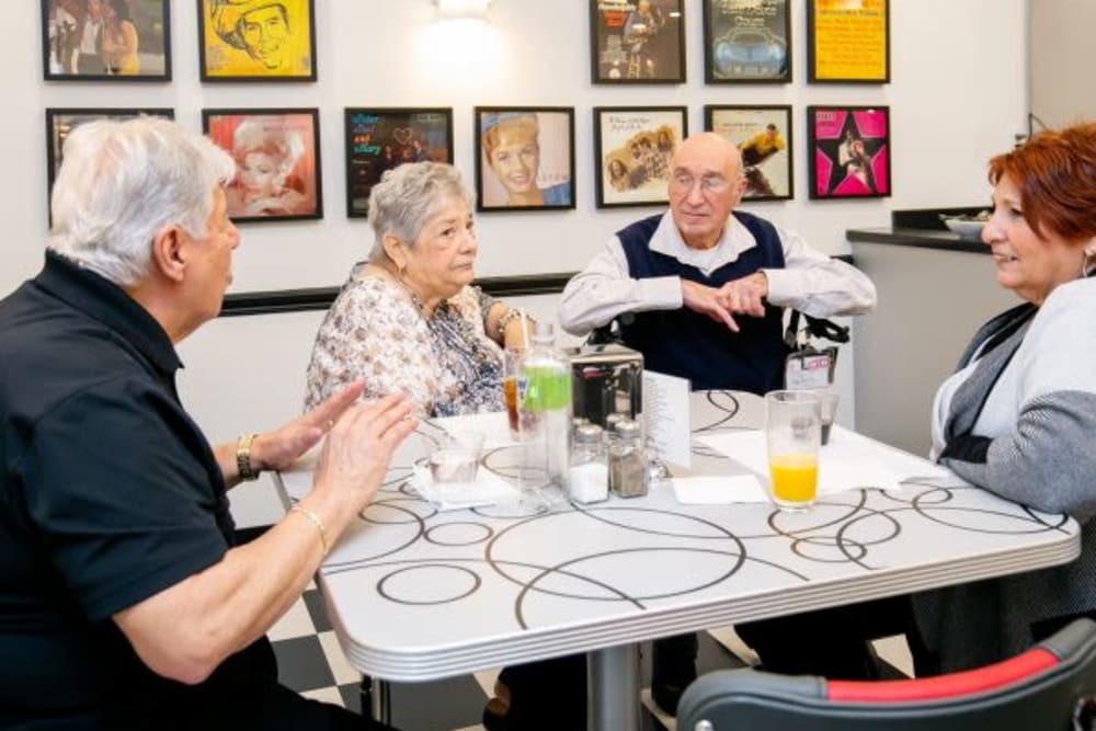 Residents enjoying beverages in the bisro/cafe at Mercer Hill at Doylestown in Doylestown, Pennsylvania