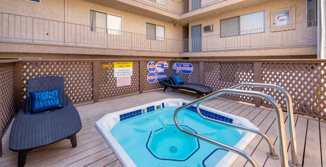 Outdoor spa with sun chairs at The Enclave in Studio City, California