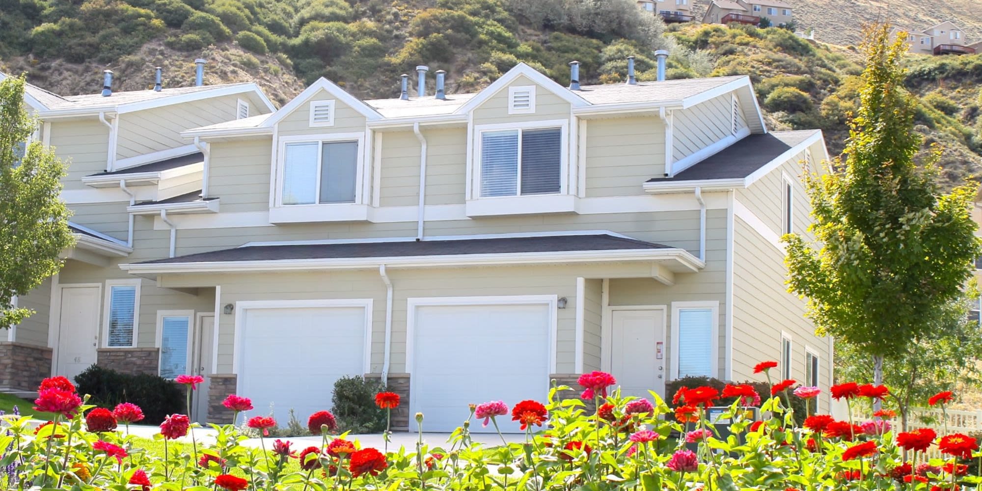 View of the garages and flowers at Liberty Hill in Draper, Utah