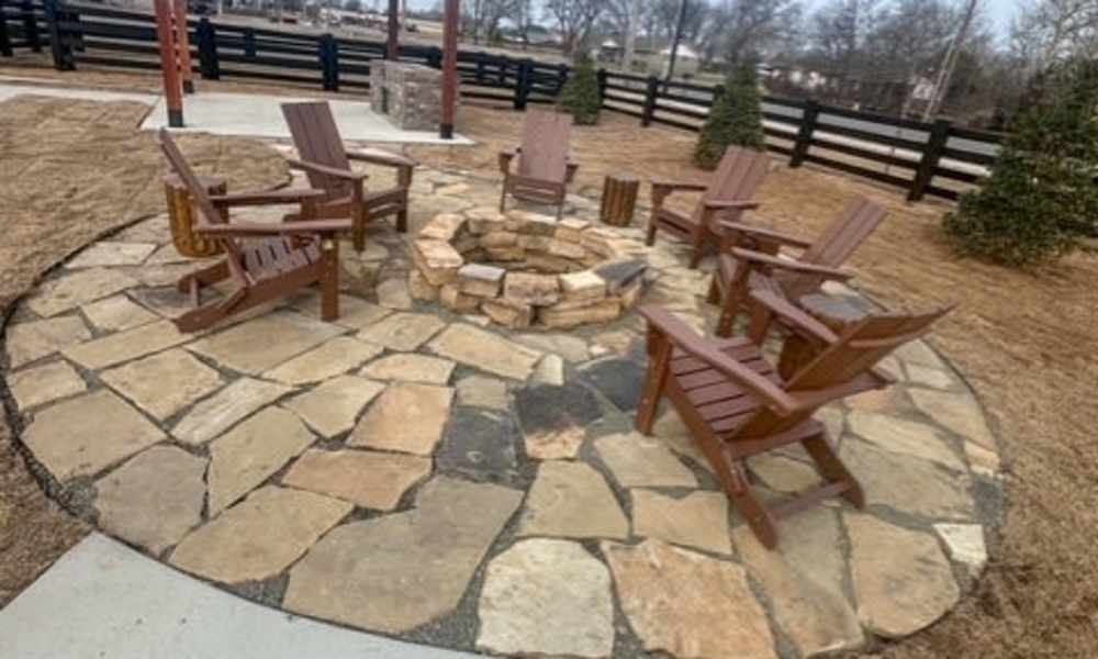 Fireplace with seating area at Copper Trail Townhomes in Owasso, Oklahoma