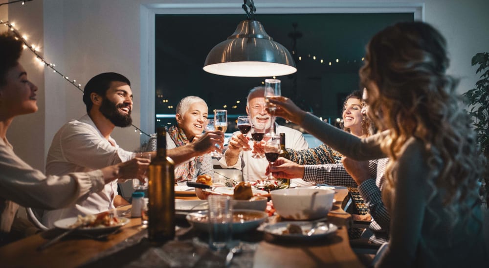 A happy friends having a dinner near Overland Park in Pickerington, Ohio