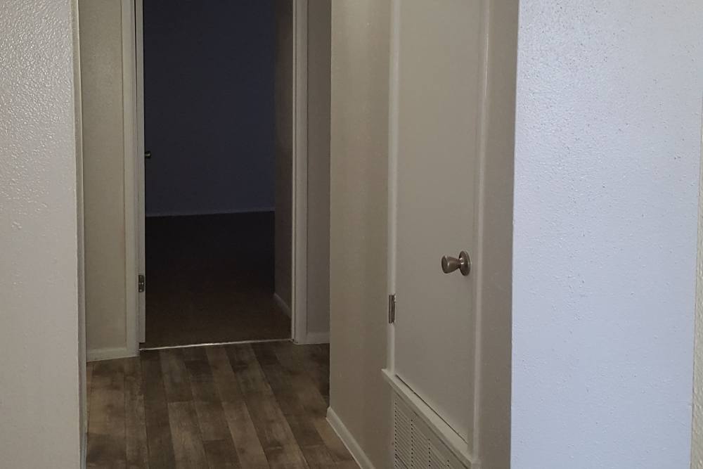 Hallway at Woodland Apartments San Antonio in San Antonio, Texas