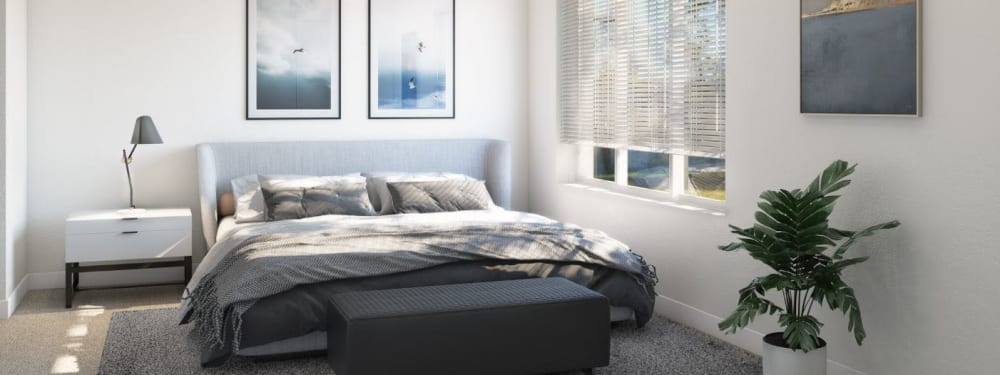 A spacious bedroom with plentiful natural light at The Hardison in Salt Lake City, Utah