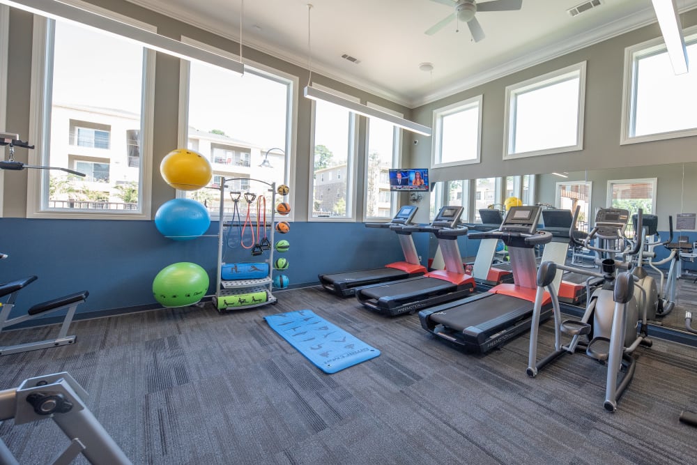 Well equipped fitness center at Hilltops in Conroe, Texas