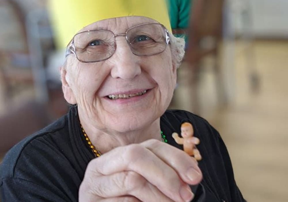 Resident celebrating Mardi Gras at Wellington Place at Hartford in Hartford, Wisconsin