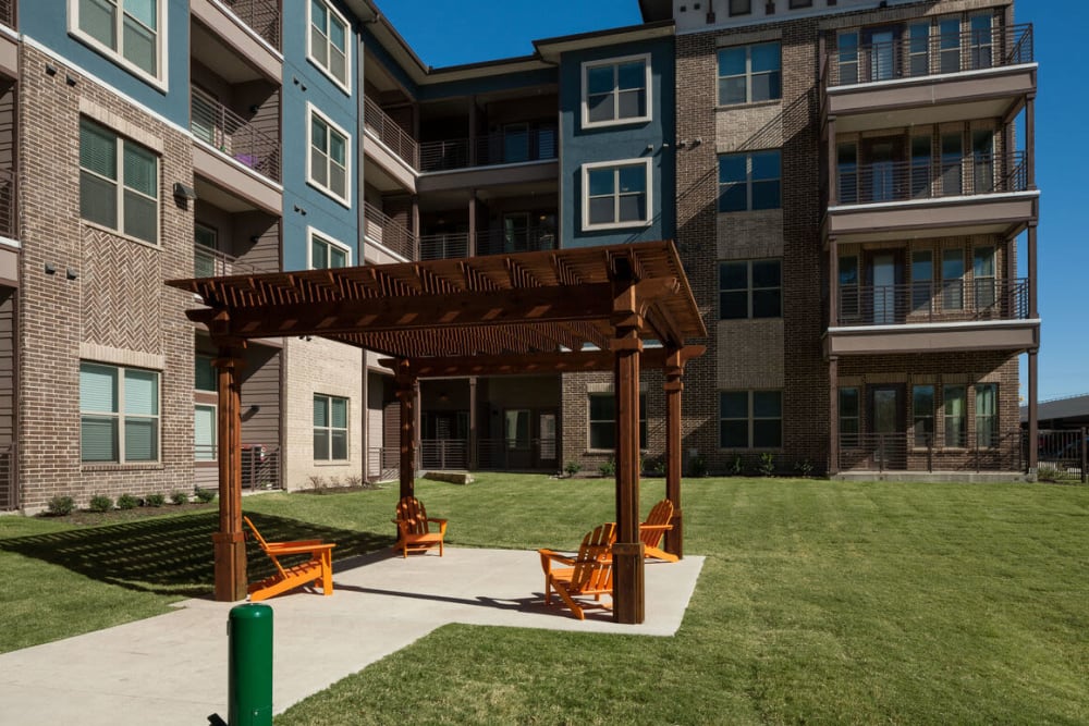 Pavilion and large grass area at Alma Hub 121 in McKinney, Texas