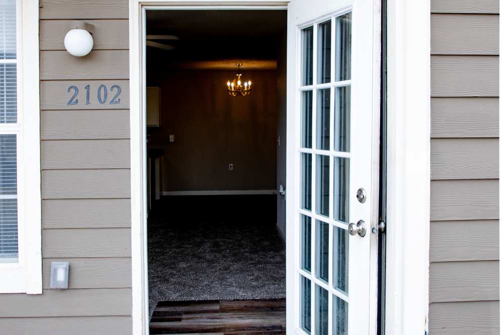 Entrance door or home at Whispering Plains Apartments in Guymon, Oklahoma