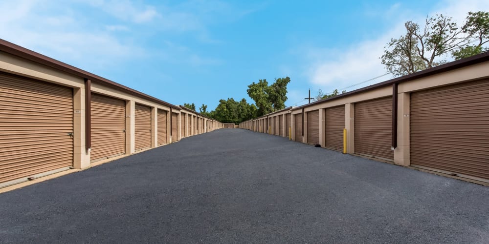 Wide driveway between outdoor units at StorQuest Self Storage in Arvada, Colorado