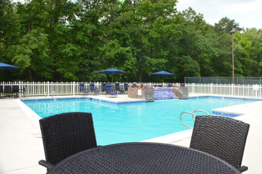 Pool-side patio seating at Laurel Pines Apartments in Richmond, Virginia